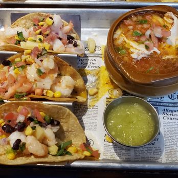 Blue Habanero Street Tacos and Tequila signature dishes Chicken Chipotle TacosQuesabirria TacoNachos Supreme